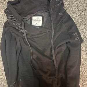 Black distressed hoodie by Chelsea DeBoer